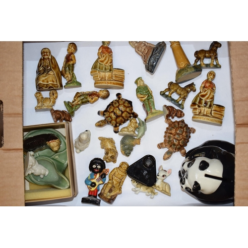 38 - A good collection of Wade to include new old stock whimsies, a panda money box, nursery rhyme figure... 