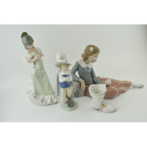 50 - A collection of Nao to include a Cavalier, a boot, a girl in a green dress and a girl playing with f... 