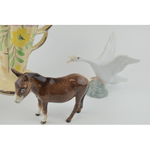 55 - An Arthur Wood floral Art Deco vase with a Beswick donkey (af), with 2 Nao geese and a Lladro Goose ... 