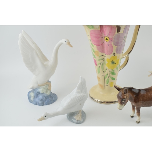 55 - An Arthur Wood floral Art Deco vase with a Beswick donkey (af), with 2 Nao geese and a Lladro Goose ... 