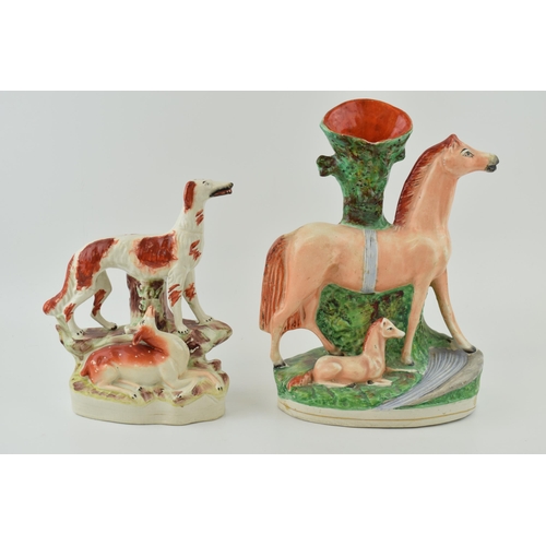 66 - A Victorian Staffordshire Setter and Deer Figure and a Horse spill vase, tallest 30cm tall (2).