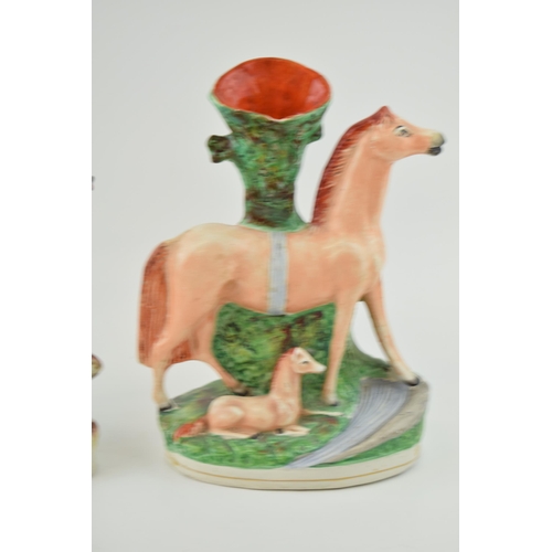 66 - A Victorian Staffordshire Setter and Deer Figure and a Horse spill vase, tallest 30cm tall (2).