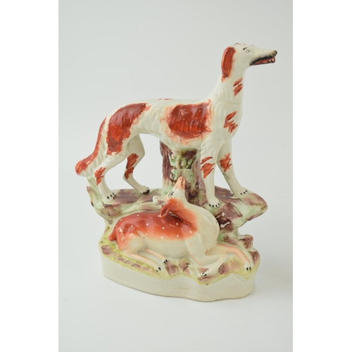 66 - A Victorian Staffordshire Setter and Deer Figure and a Horse spill vase, tallest 30cm tall (2).