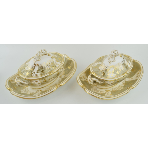 70 - A pair of early 19th century hand-painted Davenport sauce tureens and covers on fixed stands, c. 182... 