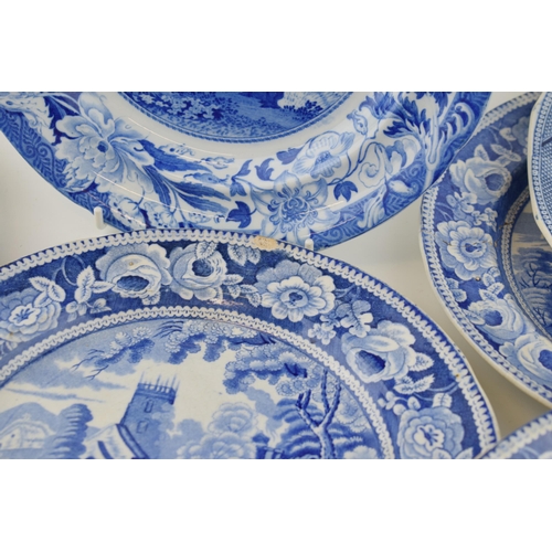 74 - A group of early 19th century blue and white transfer-printed dinner wares, to include five Village ... 