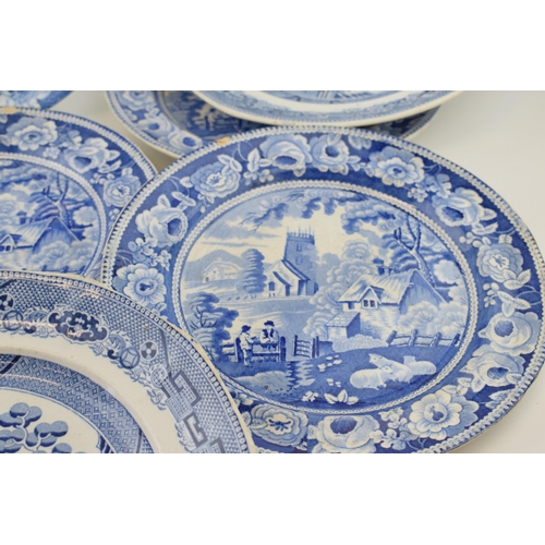 74 - A group of early 19th century blue and white transfer-printed dinner wares, to include five Village ... 