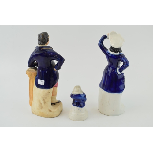 76 - A group of Victorian Staffordshire Figures, including a lady with violin, tallest 21cm (3).