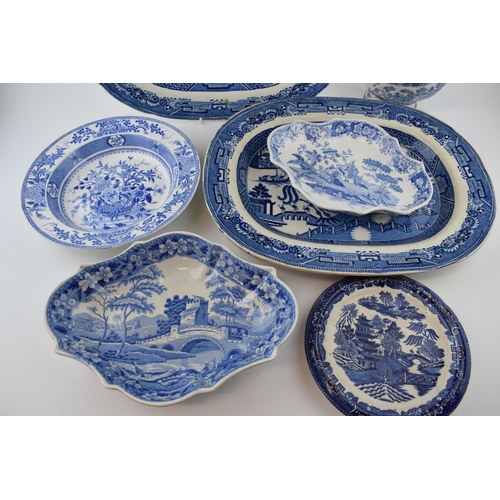 84 - A group of early 19 th century blue and white transfer-printed wares, to include: two
Willow pattern... 