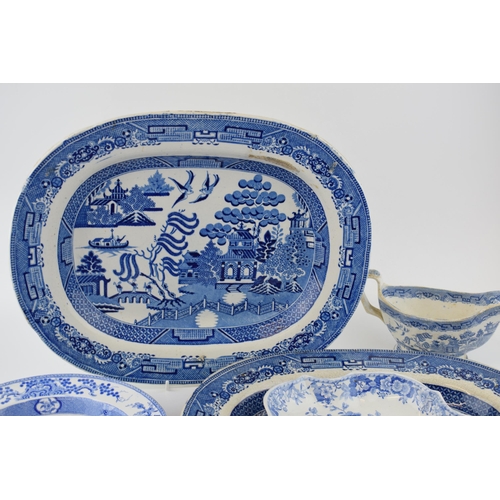 84 - A group of early 19 th century blue and white transfer-printed wares, to include: two
Willow pattern... 