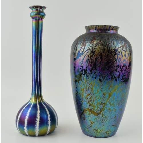 88 - A good pair of iridescent studio art glass to include an onion shaped vase with elongated neck, 27cm... 