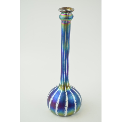 88 - A good pair of iridescent studio art glass to include an onion shaped vase with elongated neck, 27cm... 