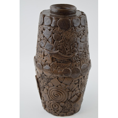 95 - A large and heavy studio pottery vase, in brown colourway, decorated with fish and swirling design, ... 