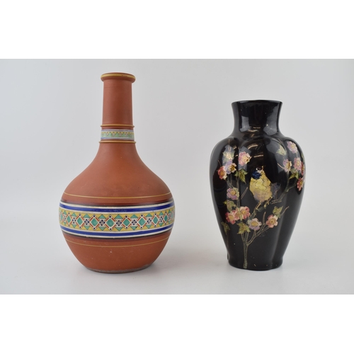 99 - A 19th century terracotta coloured bottle vase, probably Copeland, c. 1870 together with a Bretby Po... 