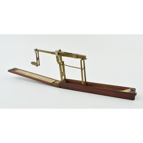 288 - A brass jewellers pocket scale in mahogany case. Manufactured by R. Brown & Sons, Prescot Lancashire... 