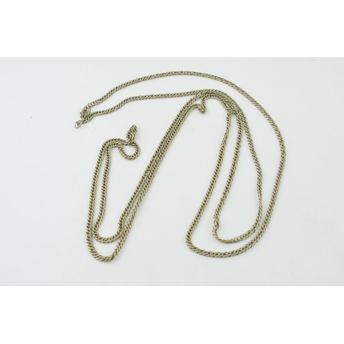 296 - A white metal antique longuard chain. Length 160cm.