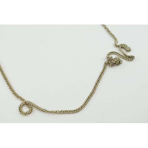 296 - A white metal antique longuard chain. Length 160cm.