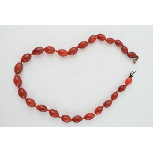 307 - Carnelian or similar semi precious stone vintage necklace. Strung oval shaped stones. Weight 58 gram... 