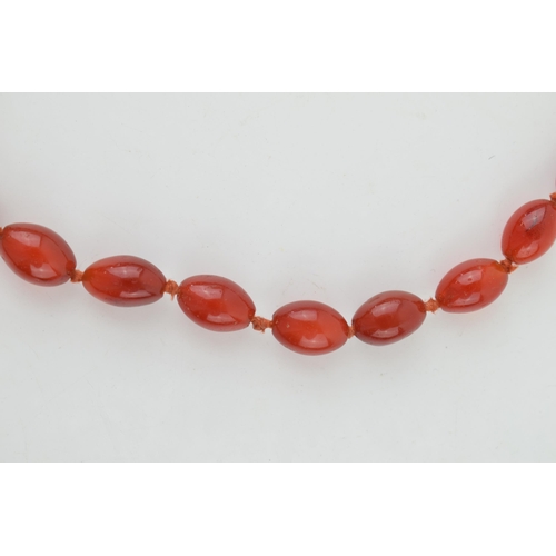 307 - Carnelian or similar semi precious stone vintage necklace. Strung oval shaped stones. Weight 58 gram... 