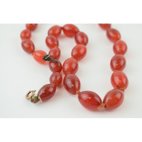 307 - Carnelian or similar semi precious stone vintage necklace. Strung oval shaped stones. Weight 58 gram... 