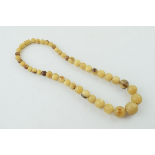 308 - Vintage carved horn graduated bead necklace, Length 47cm.