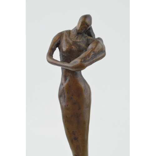 321 - A bronze figure of mother and child in an impressionist style. Mounted on wooden base. Height 24cm.