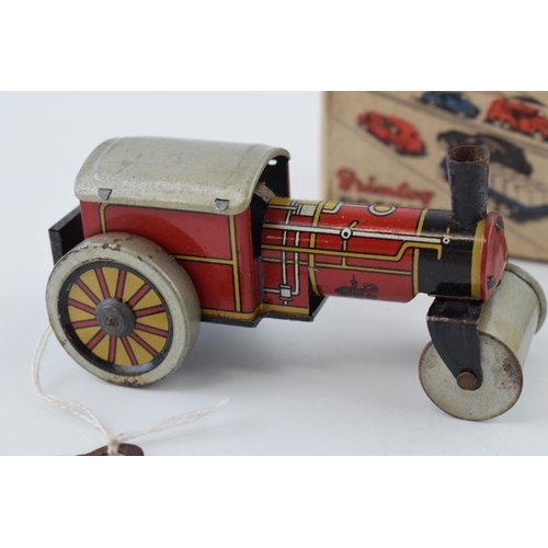 329 - Boxed Brimtoy 'British Made' 9/501 clockwork 'Steamer' tin toy in working order with key.  Height 5c... 