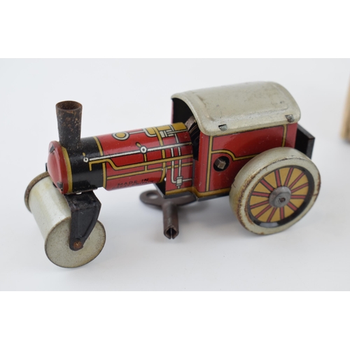 329 - Boxed Brimtoy 'British Made' 9/501 clockwork 'Steamer' tin toy in working order with key.  Height 5c... 