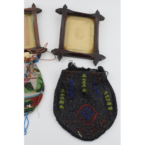 356 - A pair of 19th century wooden picture frames together with two beadwork frames. (4)