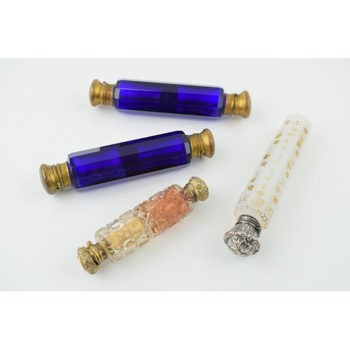 368 - A collection of antique scent bottles to include double ended examples, in cut glass and Bristol blu... 