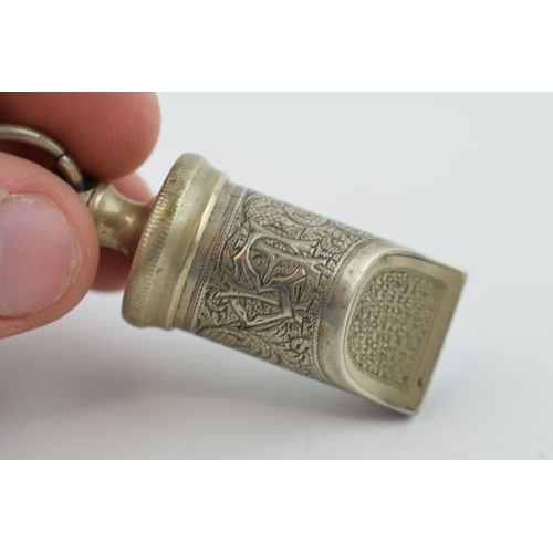 370 - An antique whistle, possibly a safety whistle with monogram. 6cm.