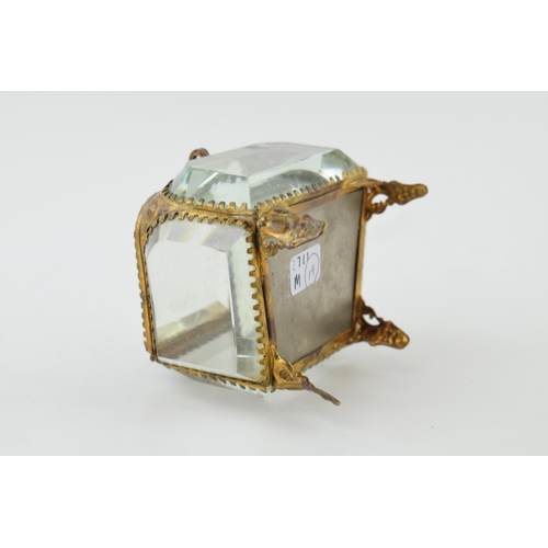 373 - A vintage Ormolu jewellery box. Heavy glass with brass frame.  inscribed to lid. Height 7.5cm.