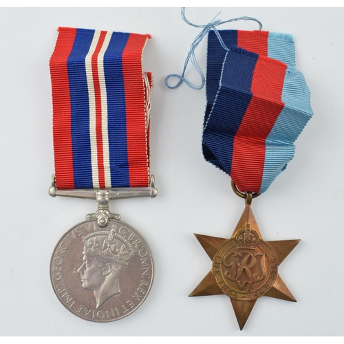 391 - A WWII War Service medal together with 1939 - 1945 Star. (2)