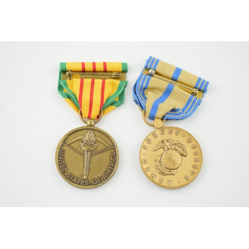 394 - A Republic of Vietnam Servicem United States of America, together with an Armed Forces Reserve medal... 