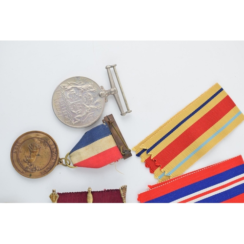 395 - A collection of WWII medals (5) in original paper sleeves together with a silver Masonic medal and a... 