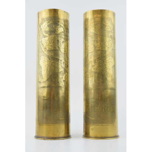 398 - A pair of Trench Art vases, 29cm tall, engraved decoration ‘Souvenir de Verdun’, one being 1915 and ... 