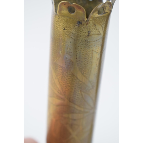 399A - A pair of trench art vases, with shaped feet, to include ‘Souvenir’ and ‘Affecteux’, 18cm tall.