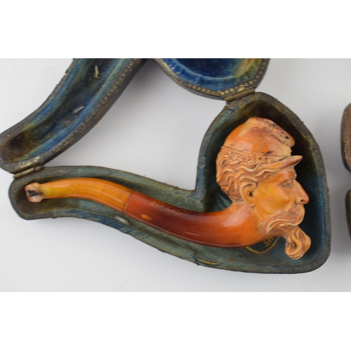 403 - A collection of smoking related items to include a Briar pipe with hallmarked silver mount and amber... 