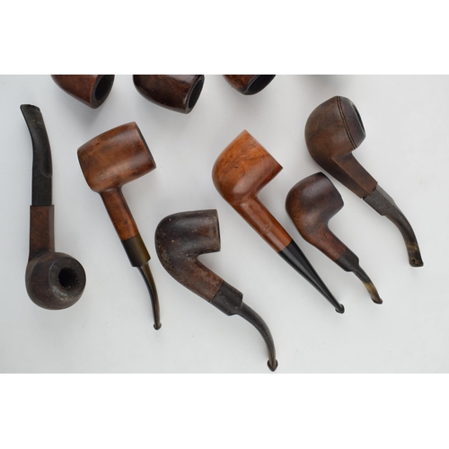 405 - A collection of vintage tobacco smoking pipes to include briar examples by 'Invicta', 'Riseagle and ... 