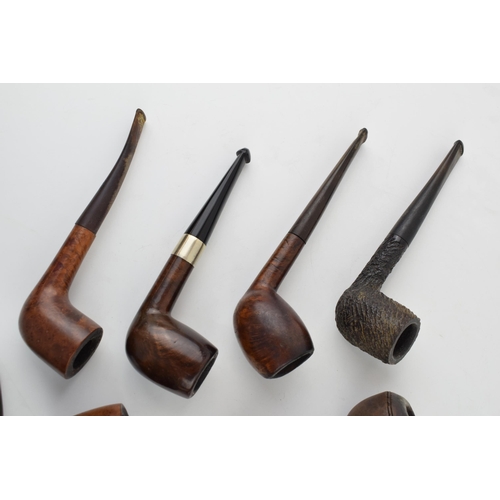 405 - A collection of vintage tobacco smoking pipes to include briar examples by 'Invicta', 'Riseagle and ... 