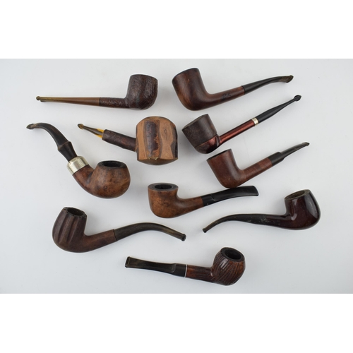 406 - A collection of vintage tobacco smoking pipes to include briar and similar examples by 'K & P Peters... 