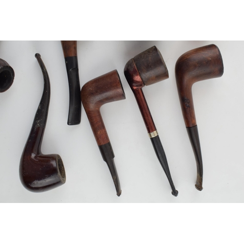 406 - A collection of vintage tobacco smoking pipes to include briar and similar examples by 'K & P Peters... 