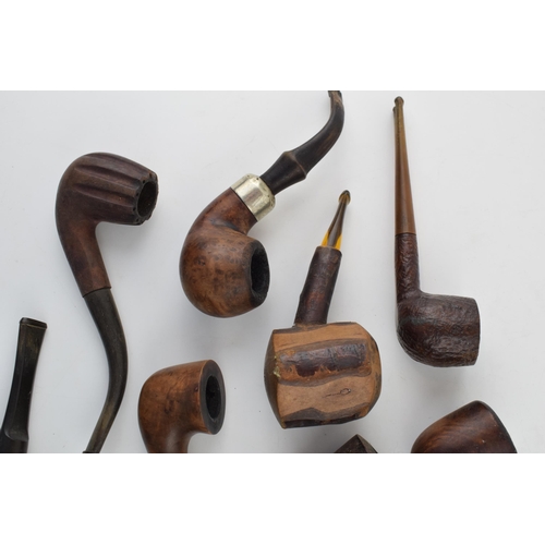 406 - A collection of vintage tobacco smoking pipes to include briar and similar examples by 'K & P Peters... 