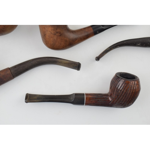 406 - A collection of vintage tobacco smoking pipes to include briar and similar examples by 'K & P Peters... 