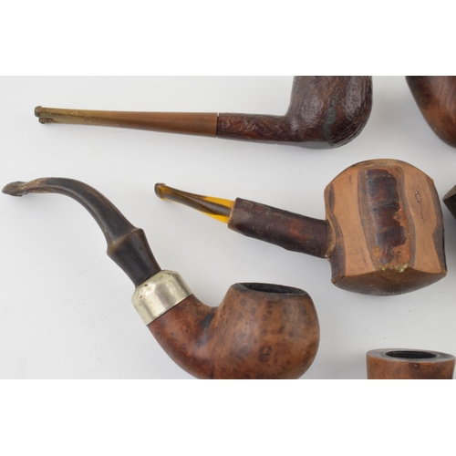 406 - A collection of vintage tobacco smoking pipes to include briar and similar examples by 'K & P Peters... 