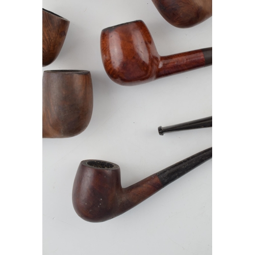 407 - A collection of vintage tobacco smoking pipes to include briar and similar examples by 'St Claude', ... 