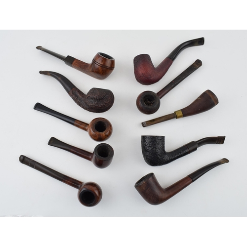 409 - A collection of vintage tobacco smoking pipes to include briar examples by 'Parker', 'Carling', 'Sup... 