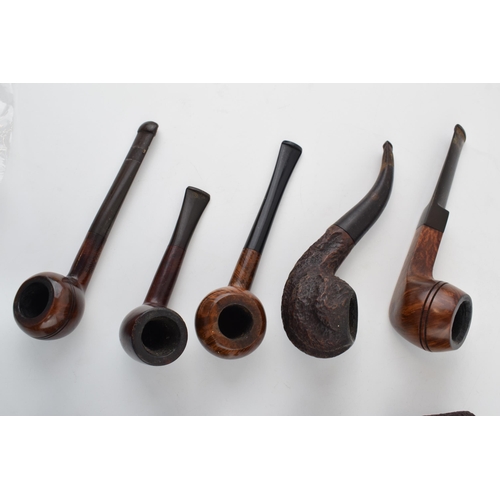 409 - A collection of vintage tobacco smoking pipes to include briar examples by 'Parker', 'Carling', 'Sup... 