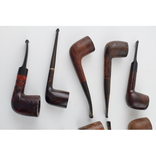 410 - A collection of vintage tobacco smoking pipes to include briar examples by 'Londonder, 'Richmond' an... 