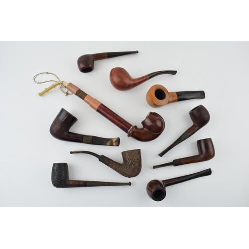 412 - A collection of vintage tobacco smoking pipes to include briar examples by 'I R Navy, 'Clifton' and ... 