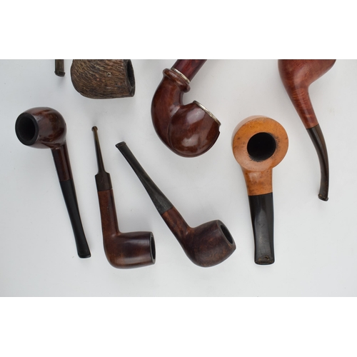 412 - A collection of vintage tobacco smoking pipes to include briar examples by 'I R Navy, 'Clifton' and ... 